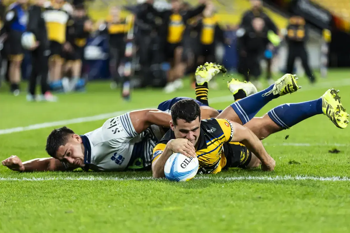 Hurricanes blitz Blues in second half to book home grand final