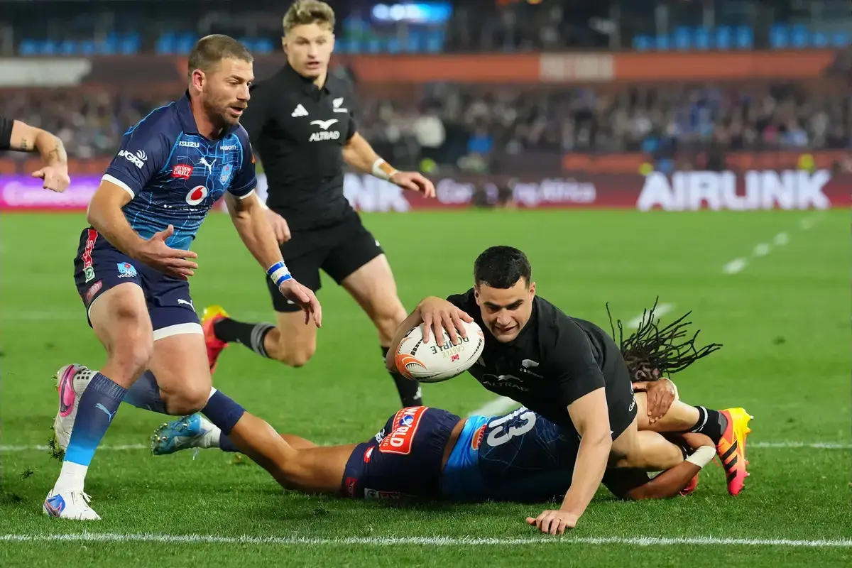 All Blacks complete clean sweep with eight-try Bulls demolition